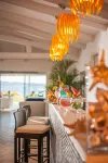 The Pelican Beach Resort & Spa - Adults Only - bar
