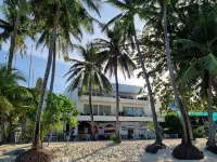 Sundown Resort & Austrian Pension House Hotel dekat Pantai Cagban