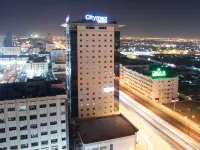 فندق سيتي ماكس الوحدة Hotels near مدينة الشارقة للسيراميك