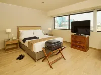 Estelar Apartamentos Bellavista Отели рядом с достопримечательностью «Centro Comercial Polvos Rosados Chorrillos»