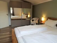 Modern vacation apartment near the North Sea with terrace and garden Hotels in Schortens