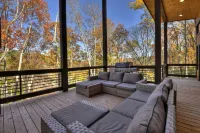 Modern 4BR Cabin w easy access, hot tub & a view!