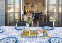 2 Master Bedrooms, Outdoor shower, Parking for 3 Cars, 2 blocks to beach.