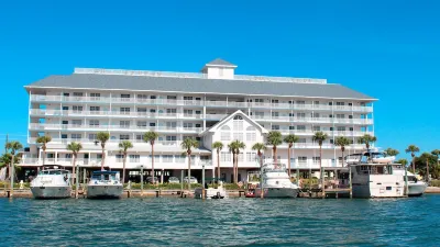 Updated - Dolphins - MOM Clean - Waterfront- Lux 4 Bedroom / 3 Bath (Unit #203)
