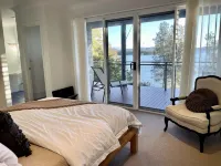 Absolute lake front - lie in bed & listen to the fish jump!