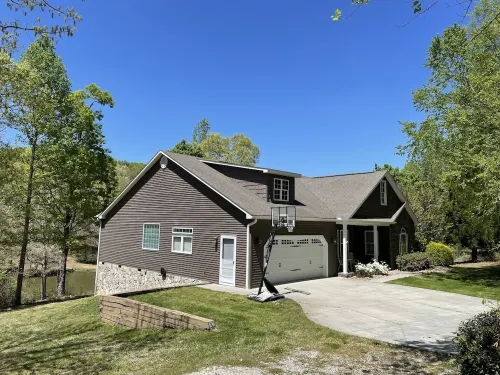 Peaceful Mountain Home: backs to a private fishing pond on two acres