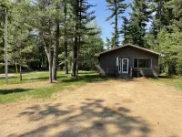 Escape to your own cabin with a private dock on the Petenwell Flowage.