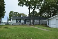 Make memories in this cozy water front house on Eagle Mountain Lake.