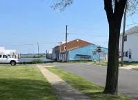 COVE DISTRICT HOUSE WITH VIEW OF CEDAR POINT