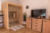 Merano center penthouse with terrace, garage, bike room and infrared sauna.