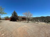 Cozy log cabin with stunning views, only 10 minutes from downtown Prescott. Hotels near The Shops at Prescott Gateway