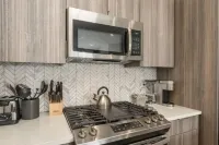 Luxury NEW SKI 2 bdroom Condo on the River