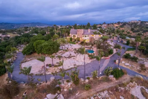 Castle on a hill, breathtaking views, surrounded with pools, trees, and lawn