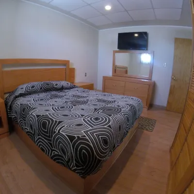 Hotel & Suites Victoria Отели рядом с достопримечательностью «Парк Тангаманга»