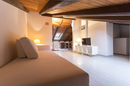 Residenza Ariosto Depandance by Studio Vita Отели рядом с достопримечательностью «Болонский университет»