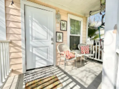 Private Parking and Sunny Front Porch - Charming Cottage Oasis