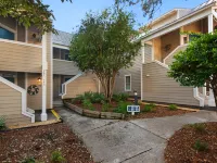 Spacious Porch and Lush Landscapes - Charming Cottage Escape Hotels in Miramar Beach