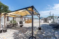 Canal Front Access and Outdoor Patio - Charming Beachside Retreat