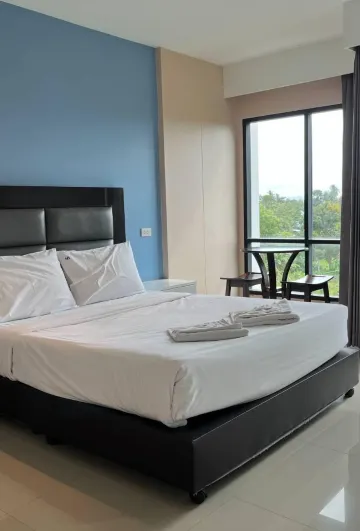 ห้องดีลักซ์ เตียงใหญ่ 1 เตียง