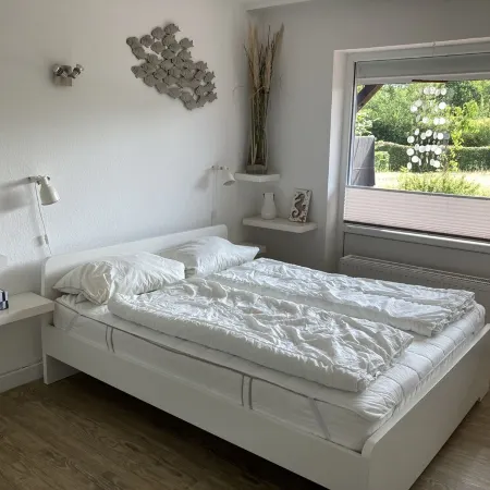 Spacious beach apartment in a quiet location with pool and sauna