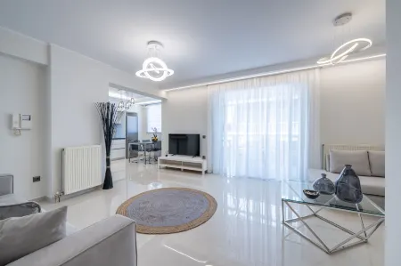 Acropolis Cozy Apartments Отели рядом с достопримечательностью «Athens Metro Mall»