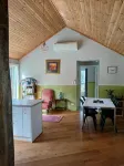 cosy cottage with wood heater, surrounded by bushland