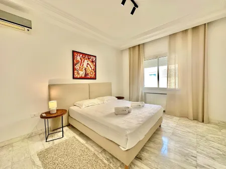 Elyssa Superbe Appartement Aux Jardins de Carthage Отели в г. El Kram