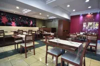 Portal Plaza Suites - فطور