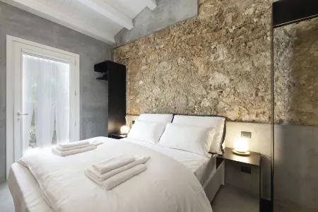 Isonzo Suites Отели рядом с достопримечательностью «Piccolo Teatro dei Pupi»