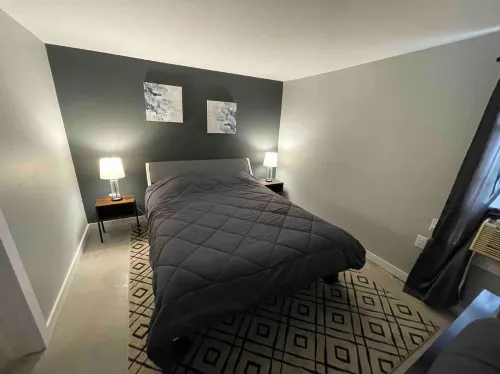 Luxurious Living Room and Kitchenette - Modern Oasis Hotels in Sodus Point