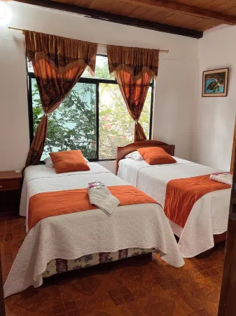 Hostal Las Gardenias Отели в г. Исабела