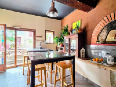 Le Clos des Roses - Chambre d'hôtes Hôtels à : Pérouges