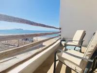 Apartment with mountain view, private balcony and access to beach front terrace.