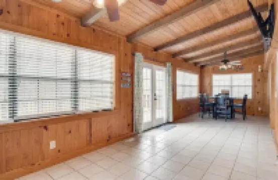 Unwind with the whole family at this serene 5-bedroom cabin retreat