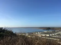 Lotus 2 bedroom dog friendly caravan with veranda offers a stunning sea view.