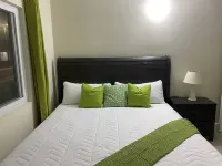 Cozy yet elegant Jamaican vacation home with access to pool, beach, gym etc