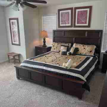 Special 4 bedroom resort home! Minutes away from Disney world! Rooms