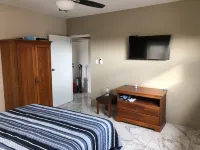 Aruba 2-bedroom duplex for rent. 4 minutes to Eagle Beach and close to shopping.
