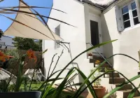 Ty Laumann small town house with garden on the port of Valves