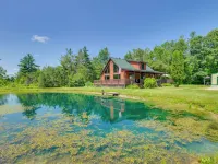 Michigan Cabin w/ On-site Fishing Pond & Deck Hotels in Oscoda County
