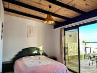 Bungalow with magnificent lagoon and mountain views, in a natural setting