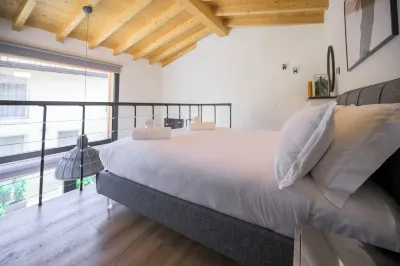 Open space on two floors in detached cottage in ancient medieval courtyard Hotels near Manerba del Garda, Hundestrand