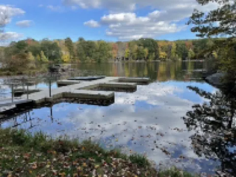 Adorable Gingerbread Style cabin in gorgeous amenity filled lake/pool community