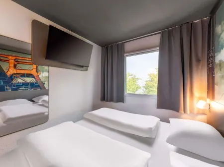 B&B Hotel Würzburg-Ost Отели в г. Тайльхайм