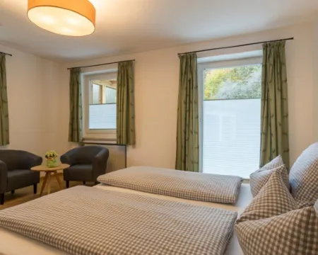 อพาร์ตเมนต์ มิท ซไว ชลาฟซิมเมิร์น อิน ไกรเนา โรงแรมในGrainau