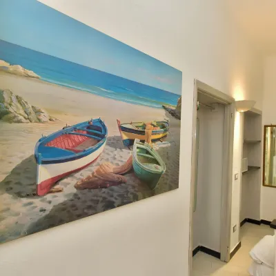 فيا ديل سانتو Hotels near شاطئ فيجينا (Fegina Beach)