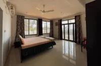 Gintara Homestay by Evaddo Stays - maisons de vacances