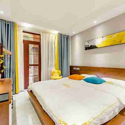 西嶺雪山花水灣太陽島度假別墅（温泉南街1號分店） Rooms