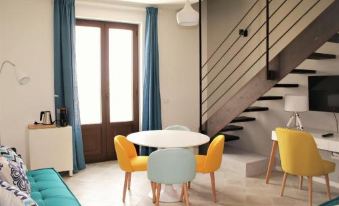There is a table with various items, including a selection of tea at Toremare Suite Marzamemi
