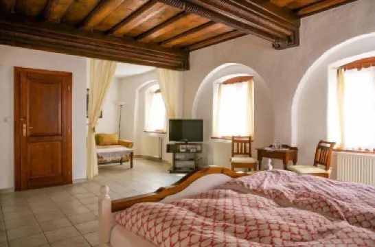 Pension U Zámku Hoteles cerca de Church of St Jošt